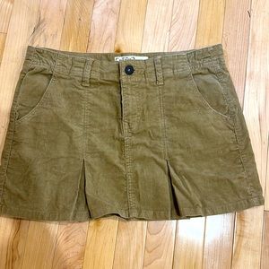 Corduroy khaki mini skirt.  Very cute.